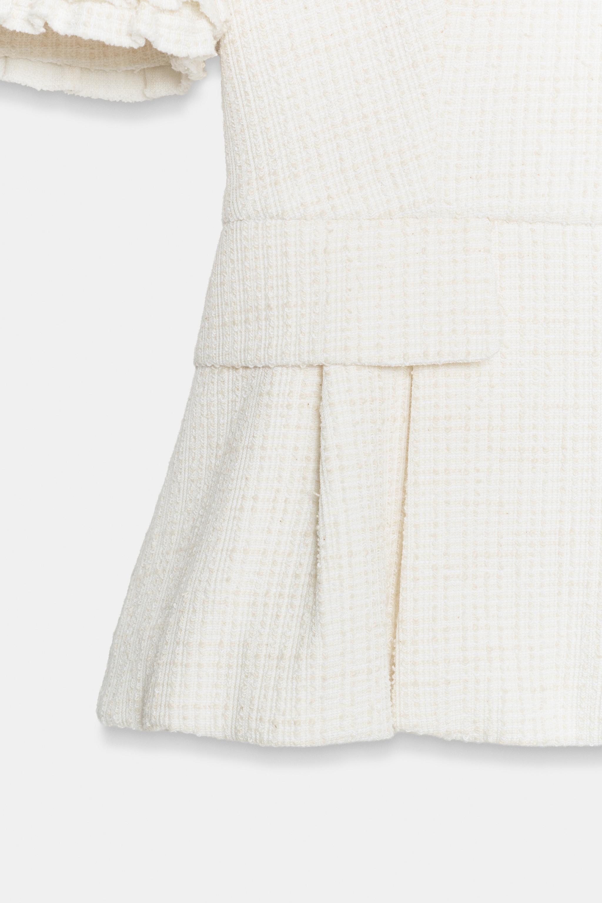 SHORT-SLEEVE RUFFLED PEPLUM JACKET